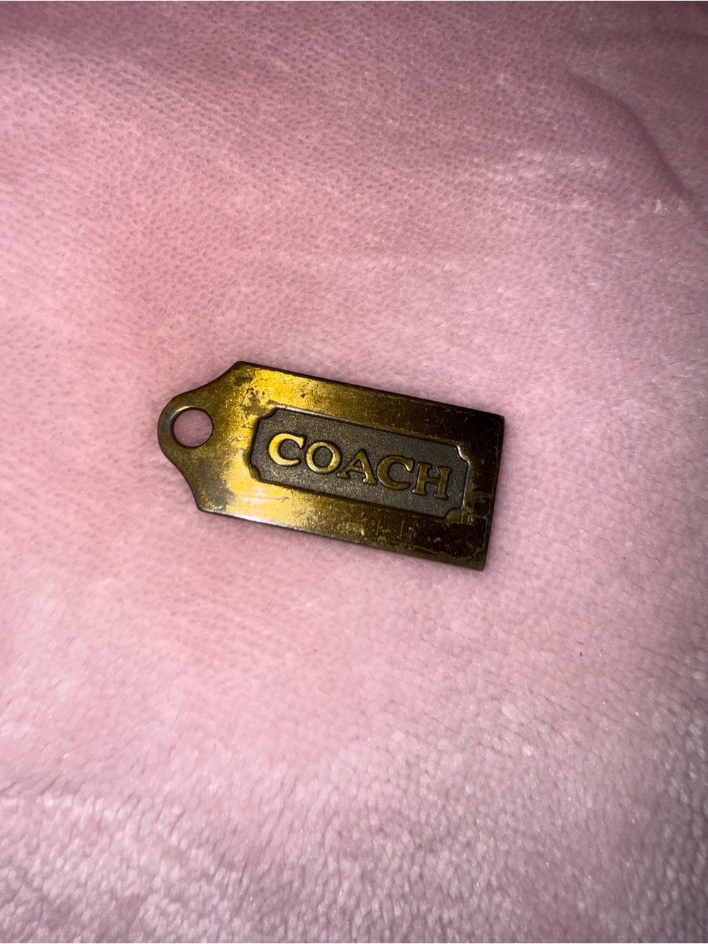Coach Brass Logo Tag Charm in Gold